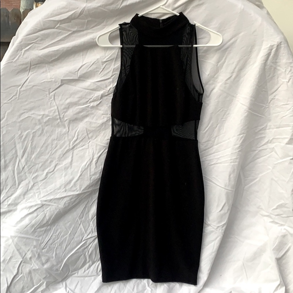 Black bodycoj mini dress with mesh cutouts